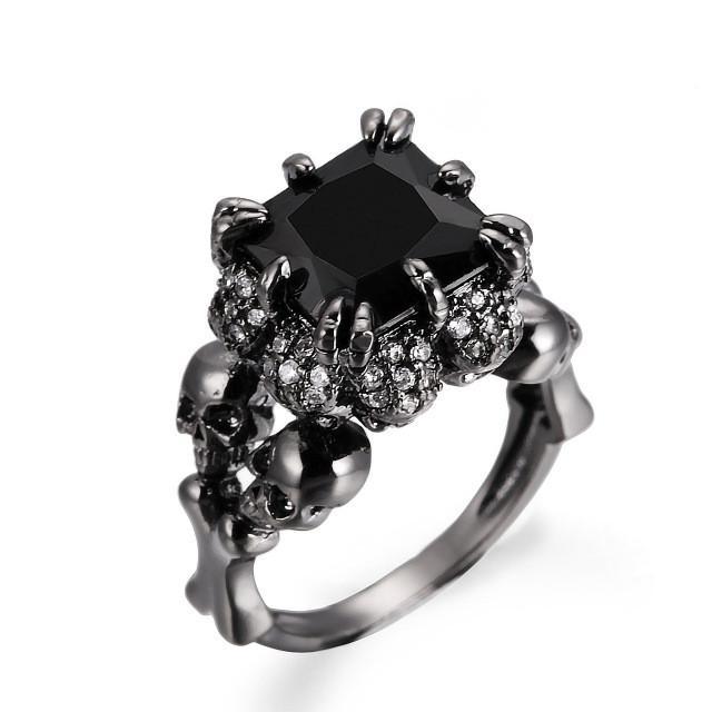 Power Clasp Black Gold Colored Ring